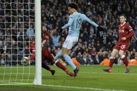 Manchester City's Leroy Sane, 19, hits a goal that was disallowed during the Champions League quarterfinal second leg soccer match between Manchester City and Liverpool at Etihad stadium in Manchester, England, Tuesday, April 10, 2018. (AP Photo/Rui Vieira)