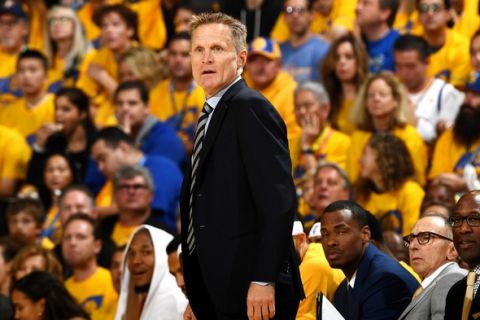 OAKLAND, CA - APRIL 16: Steve Kerr of the Golden State Warriors looks on during the game against the Portland Trail Blazers during the Western Conference Quarterfinals of the 2017 NBA Playoffs on April 16, 2017 at Oracle Arena in Oakland, California. NOTE TO USER: User expressly acknowledges and agrees that, by downloading and or using this photograph, user is consenting to the terms and conditions of Getty Images License Agreement. Mandatory Copyright Notice: Copyright 2017 NBAE (Photo by Garrett Ellwood/NBAE via Getty Images)