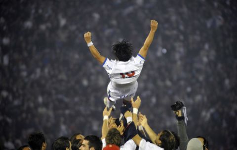 Uruguay's Nacional player, Argentine Marcelo Gallardo is thrown to the air by his teammates at the end of his last professional match, after Nacional defeated Defensor and won the Uruguayan tournament, at the Estadio Centenario in Montevideo on June 12, 2011. . AFP PHOTO / Miguel ROJO (Photo credit should read MIGUEL ROJO/AFP/Getty Images)