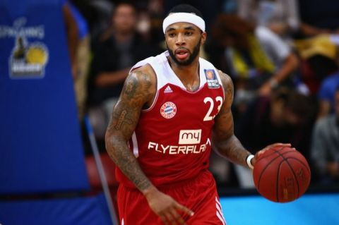 LUDWIGSBURG, GERMANY - OCTOBER 09: Malcolm Delaney of Muenchen controles the ball during the BBL match between MHP RIESEN Ludwigsburg and Bayern Muenchen at MHPArena on October 9, 2013 in Ludwigsburg, Germany.  (Photo by Alex Grimm/Bongarts/Getty Images)