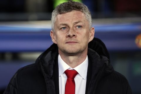 Manchester United coach Ole Gunnar Solskjaer looks out from the bench prior the Champions League quarterfinal, second leg, soccer match between FC Barcelona and Manchester United at the Camp Nou stadium in Barcelona, Spain, Tuesday, April 16, 2019. (AP Photo/Manu Fernandez)