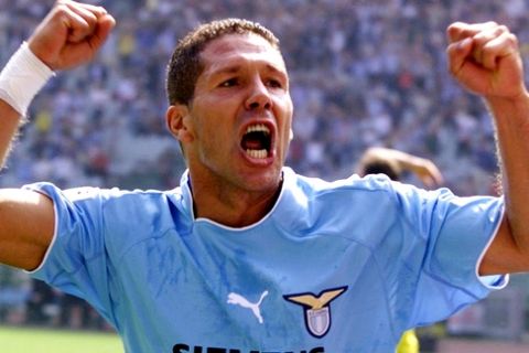 Lazio's Argentine midfielder Diego Simeone celebrates after scoring the first goal for his team during Italian major league soccer match against Chievo at the Olympic stadium in Rome Sunday, Sept. 15, 2002. Chievo won 3-2. (AP Photo/Giuseppe Calzuola)