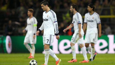 DORTMUND, GERMANY - APRIL 24:  Cristiano Ronaldo of Real Madrid walks dejected during the UEFA Champions League semi final first leg match between Borussia Dortmund and Real Madrid at Signal Iduna Park on April 24, 2013 in Dortmund, Germany.  (Photo by Joern Pollex/Bongarts/Getty Images)