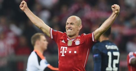 MUNICH, GERMANY - APRIL 09:  Arjen Robben of Bayern Muenchen celebrates victory after the UEFA Champions League Quarter Final second leg match between FC Bayern Muenchen and Manchester United at Allianz Arena on April 9, 2014 in Munich, Germany.  (Photo by Lars Baron/Bongarts/Getty Images)