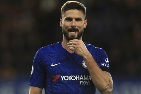 Chelsea's Olivier Giroud walks on the pitch the English Premier League soccer match between Chelsea and West Ham at Stamford Bridge Stadium in London, England, in London, England, Saturday, Nov. 30, 2019. (AP Photo/Leila Coker)