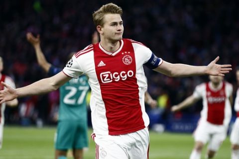 Ajax's Matthijs de Ligt celebrates after scoring the opening goal during the Champions League semifinal second leg soccer match between Ajax and Tottenham Hotspur at the Johan Cruyff ArenA in Amsterdam, Netherlands, Wednesday, May 8, 2019. (AP Photo/Peter Dejong)