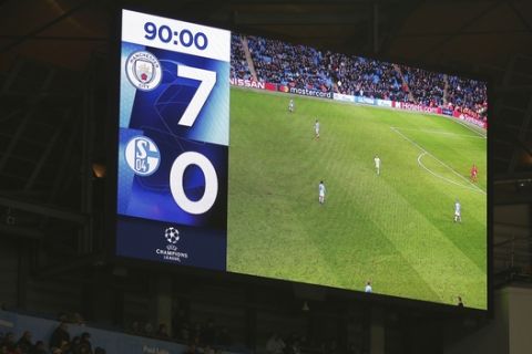 The stadium screen displays the result at the end of the Champions League round of 16 second leg, soccer match between Manchester City and Schalke 04 at Etihad stadium in Manchester, England, Tuesday, March 12, 2019. (AP Photo/Dave Thompson)