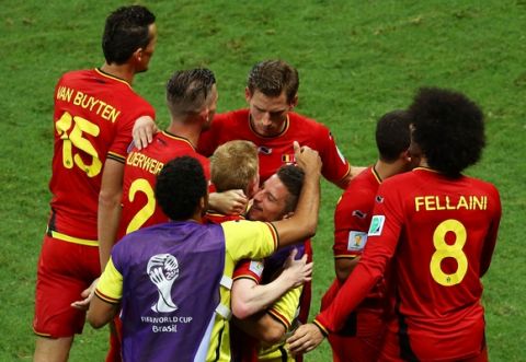 SALVADOR, BRAZIL - JULY 01:  Kevin De Bruyne of Belgium celebrates with teammates after scoring his team's first goal in extra time during the 2014 FIFA World Cup Brazil Round of 16 match between Belgium and the United States at Arena Fonte Nova on July 1, 2014 in Salvador, Brazil.  (Photo by Robert Cianflone/Getty Images)