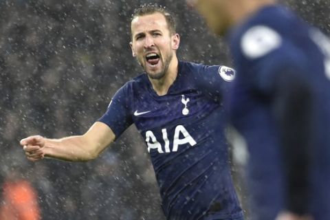 Tottenham's Harry Kane reacts during the English Premier League soccer match between Wolverhampton Wanderers and Tottenham Hotspur at the Molineux Stadium in Wolverhampton, England, Sunday, Dec. 15, 2019. (AP Photo/Rui Vieira)