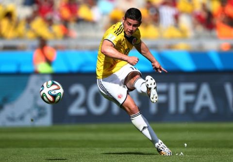 BELO HORIZONTE, BRAZIL - JUNE 14:  James Rodriguez of Colombia kicks the ball during the 2014 FIFA World Cup Brazil Group C match between Colombia and Greece at Estadio Mineirao on June 14, 2014 in Belo Horizonte, Brazil.  (Photo by Paul Gilham/Getty Images)