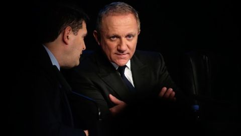 Francois-Henri Pinault, CEO of luxury group Kering, right, and and his Managing Director, Jean-François Palus, left, give a press conference, in Paris, Tuesday, Feb. 17, 2015. Gucci owner Kering on Tuesday said the weak euro and strong dollar was likely to boost revenue this year but could hit margins in the first half due to its hedging policies. (AP Photo/Thibault Camus)
