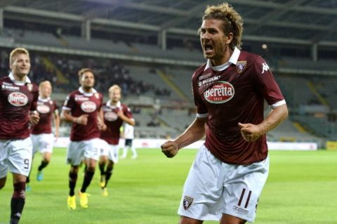 TURIN, ITALY - AUGUST 25:  Alessio Cerchi of Torino celebrates after scoring his team's second goal during the Serie A match between Torino FC and US Sassuolo Calcio at Stadio Olimpico di Torino on August 25, 2013 in Turin, Italy.  (Photo by Tullio M. Puglia/Getty Images)
