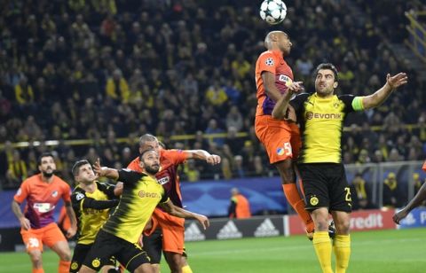 Dortmund's Sokratis, right, jumps for the ball with APOEL Nicosia's Carlao during the Champions League group H soccer match between Borussia Dortmund and APOEL Nicosia in Dortmund, Germany, Wednesday, Nov. 1, 2017. (AP Photo/Martin Meissner)