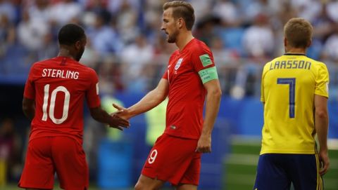 England's Harry Kane handshakes England's Raheem Sterling during the quarterfinal match between Sweden and England at the 2018 soccer World Cup in the Samara Arena, in Samara, Russia, Saturday, July 7, 2018. (AP Photo/Francisco Seco)