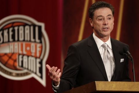 Inductee Rick Pitino speaks during the enshrinement ceremony for the 2013 class of the Naismith Memorial Basketball Hall of Fame at Symphony Hall in Springfield, Mass., Sunday, Sept. 8, 2013. (AP Photo/Steven Senne)