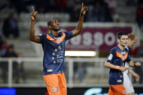 Montpellier's Nigerian forward John Utaka (L) celebrates after scoring a goal during the French L1 football match Auxerre vs Montpellier, on May 20, 2012 at the Abbe-Deschamps stadium in Auxerre. AFP PHOTO / JEFF PACHOUD        (Photo credit should read JEFF PACHOUD/AFP/GettyImages)