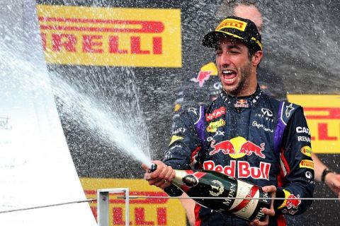 BUDAPEST, HUNGARY - JULY 27:  Daniel Ricciardo of Australia and Infiniti Red Bull Racing celebrates victory on the podium after the Hungarian Formula One Grand Prix at Hungaroring on July 27, 2014 in Budapest, Hungary.  (Photo by Mark Thompson/Getty Images) *** Local Caption *** Daniel Ricciardo
