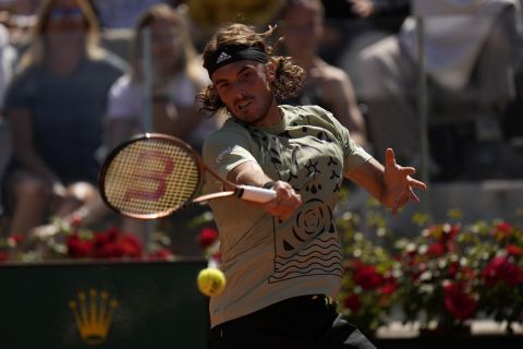 Greece's Stefanos Tsitsipas returns the ball to Germany's Alexander Zverev during their semifinal match at the Italian Open tennis tournament, in Rome, Saturday, May 14, 2022. (AP Photo/Alessandra Tarantino)