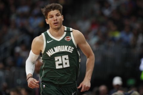 Milwaukee Bucks guard Kyle Korver (26) in the second half of an NBA basketball game Monday, March 9, 2020, in Denver. The Nuggets won 109-95. (AP Photo/David Zalubowski)