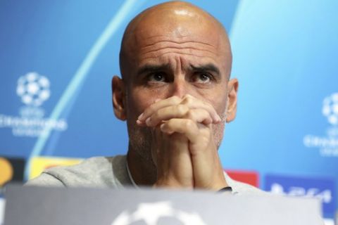 Manchester City soccer team manager Pep Guardiola reacts during the press conference in Manchester, England, Monday Oct. 21, 2019.  Man City are scheduled to play Italy's Atalanta a a Champions League clash on Tuesday Oct. 22. (Martin Rickett/PA via AP)