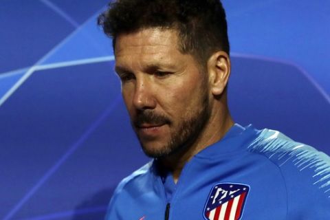 Atletico Madrid's head coach Diego Simeone arrives for a press conference at Wanda Metropolitano stadium in Madrid, Spain, Monday, Nov. 5, 2018. Atletico will play Borussia Dortmund Tuesday in a Group A Champions League soccer match. (AP Photo/Manu Fernandez)
