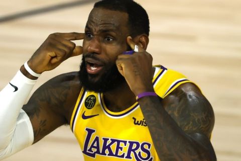 LeBron James of the Los Angeles Lakers reacts against the Oklahoma City Thunder during the second quarter during an NBA basketball game Wednesday, Aug. 5, 2020, in Lake Buena Vista, Fla. (Kevin C. Cox/Pool Photo via AP)