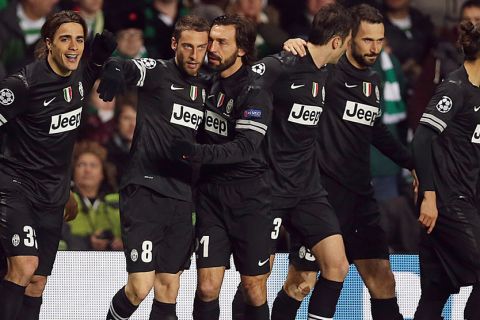 Juventus's Italian striker Alessandro Matri (L) celebrates with teammates defender Claudio Marchisio (2nd L) and Andreas Pirlo (C) after scoring the opening goal during the UEFA Champions League last sixteen football match between Celtic and Juventus at Celtic park in Glasgow, Scotland, on February 12, 2013. AFP PHOTO/IAN MACNICOL        (Photo credit should read Ian MacNicol/AFP/Getty Images)