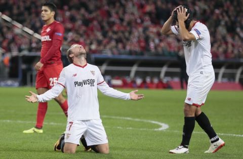Sevilla's Nolito, right, and Sevilla's Michael Krohn-Dehli react after missing a chance during the Champions League Group E soccer match between Spartak Moscow and Sevilla in Moscow, Russia, Tuesday, Oct. 17, 2017. (AP Photo/Ivan Sekretarev)