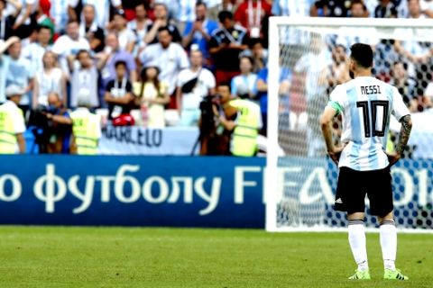 Argentina's Lionel Messi stands on the field after the round of 16 match between France and Argentina, at the 2018 soccer World Cup at the Kazan Arena in Kazan, Russia, Saturday, June 30, 2018. France won 4-3. (AP Photo/David Vincent)