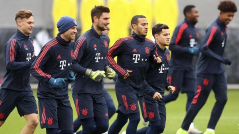 Bayern's Joshua Kimmich, from left, Thomas Mueller, Sven Ulreich, Thiago and Coutinho warm up during a training session prior to the Champions League group B soccer match between Bayern Munich and Olympiakos in Munich, Germany, Tuesday, Nov. 5, 2019. Bayern will face Olympiakos on Wednesday. (AP Photo/Matthias Schrader)