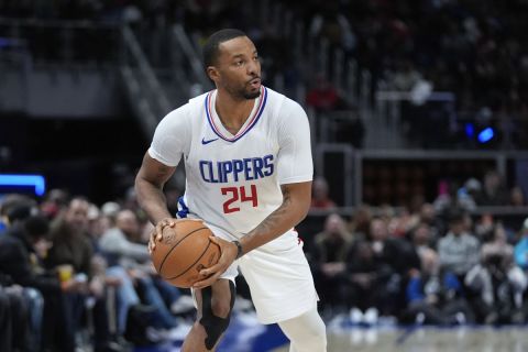 Los Angeles Clippers guard Norman Powell (24) plays against the Detroit Pistons in the second half of an NBA basketball game in Detroit, Friday, Feb. 2, 2024. (AP Photo/Paul Sancya)