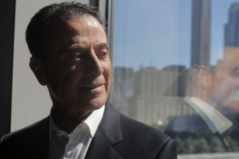 Former Louisville NCAA college basketball head coach Rick Pitino sits for a portrait, Tuesday, Sept. 4, 2018, in New York. It's been nearly a year since Pitino was fired from Louisville after the school acknowledged that it's men's program was being investigated as part of a federal corruption probe. He wrote a book "Pitino: My Story" to tell his side of the events that led to his ousting from the school he coached at for 16 years and led to a national championship in 2013. (AP Photo/Julie Jacobson)
