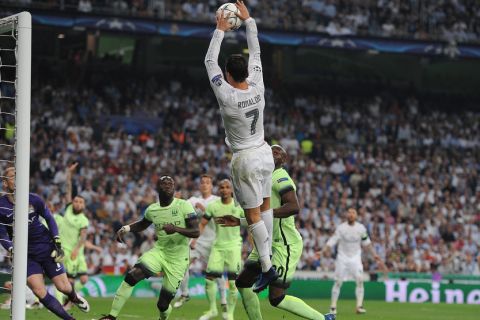 "MADRID, SPAIN - MAY 04:  Cristiano Ronaldo of Real Madrid handles the ball during the UEFA Champions League Semi Final second leg match between Real Madrid and Manchester City FC at Estadio Santiago Bernabeu on May 4, 2016 in Madrid, Spain.  (Photo by Denis Doyle - UEFA/UEFA via Getty Images)"