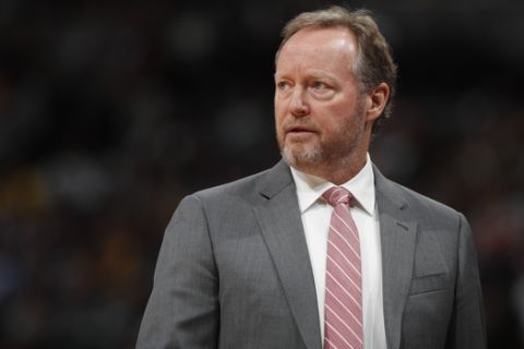 Milwaukee Bucks head coach Mike Budenholzer in the second half of an NBA basketball game Monday, March 9, 2020, in Denver. The Nuggets won 109-95. (AP Photo/David Zalubowski)