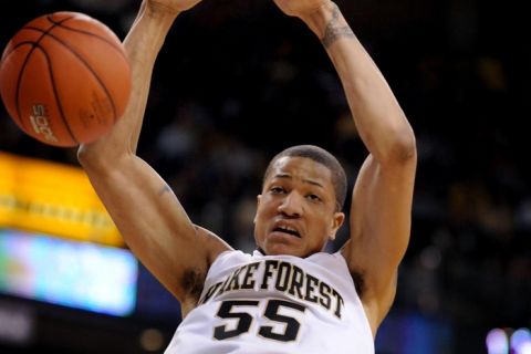 Feb 08, 2009; Winston-Salem, NC, USA;  Wake Forest Demon Deacons center Tony Woods (55) dunks the ball in the first half of the game against the Boston College Eagles at Lawrence Joel Coliseum.  Mandatory Credit: Steve Dykes-US PRESSWIRE