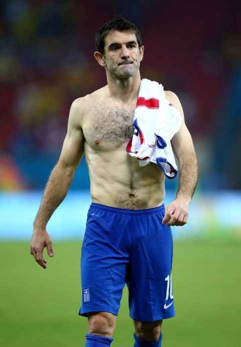 RECIFE, BRAZIL - JUNE 29:  Giorgos Karagounis of Greece looks dejected after being defeated by Costa Rica in a penalty shootout during the 2014 FIFA World Cup Brazil Round of 16 match between Costa Rica and Greece at Arena Pernambuco on June 29, 2014 in Recife, Brazil.  (Photo by Paul Gilham/Getty Images)