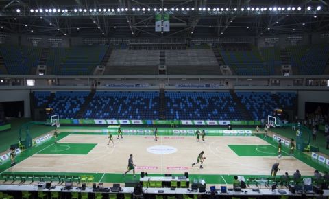 Brazil's women national team practice in the Carioca Arena 1 at the Olympic Park in Rio de Janeiro, Brazil, Friday, Jan. 15, 2016. Television viewers won't notice when the games open in just over six months, but Rio organizers are slashing everywhere to reduce millions in spending to balance the operating budget. (AP Photo/Leo Correa)