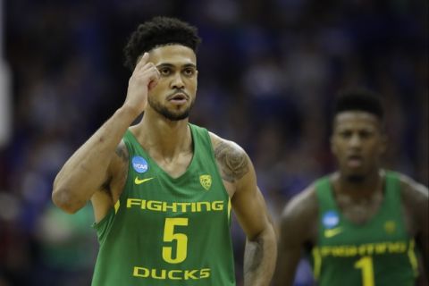 Oregon guard Tyler Dorsey reacts during the second half of a regional final against Kansas in the NCAA men's college basketball tournament, Saturday, March 25, 2017, in Kansas City, Mo. (AP Photo/Charlie Riedel)