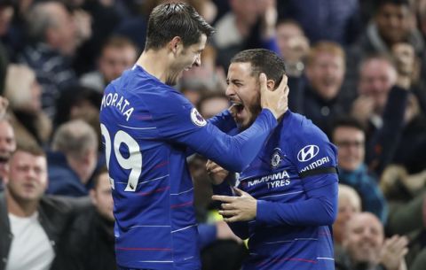 Chelsea's Alvaro Morata, left, celebrates with teammate Eden Hazard after scoring his side's second goal during the English Premier League soccer match between Chelsea and Crystal Palace at Stamford Bridge stadium in London, Sunday, Nov. 4, 2018. (AP Photo/Frank Augstein)