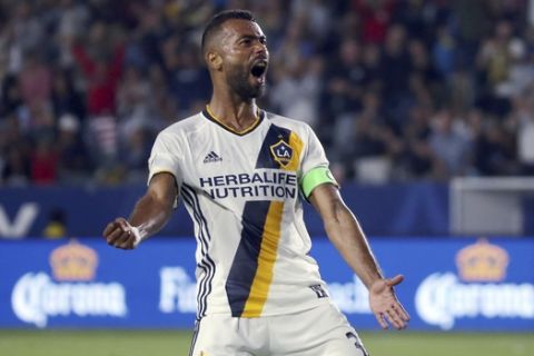 LA Galaxy defender Ashley Cole (3) celebrates his goal against Real Salt Lake in the first half of an MLS soccer match in Carson, Calif., Tuesday, July 4, 2017. (AP Photo/Reed Saxon)