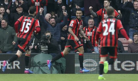 Bournemouth's Joshua King, centre, celebrates scoring his side's second goal during the English Premier League match West Ham against Bournemouth at the Vitality Stadium, Bournemouth, England, Saturday March 11, 2017. (Steven Paston/PA via AP)