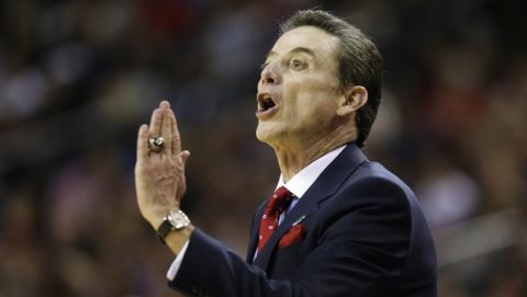 Louisville coach Rick Pitino calls to his team during the first half of an NCAA college basketball tournament game against Northern Iowa in the Round of 32, Sunday, March 22, 2015, in Seattle. (AP Photo/Ted S. Warren)