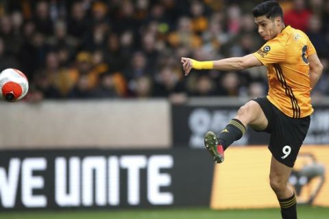 Wolverhampton Wanderers' Raul Jimenez shoots towards goal during the English Premier League soccer match between the Wolverhampton Wanderers and Brighton and Hove Albion, at Molineux, in Wolverhampton, England, Saturday March 7, 2020. (Nick Potts/PA via AP)