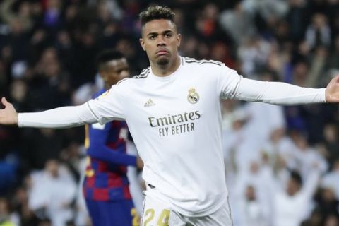 Real Madrid's Mariano Diaz celebrates after scoring his side's second goal during during the Spanish La Liga soccer match between Real Madrid and Barcelona at the Santiago Bernabeu stadium in Madrid, Spain, Sunday, March 1, 2020. (AP Photo/Manu Fernandez)