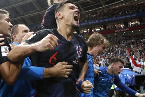 Croatia's Dejan Lovren celebrates after Croatia's Mario Mandzukic scored his side's second goal during the semifinal match between Croatia and England at the 2018 soccer World Cup in the Luzhniki Stadium in Moscow, Russia, Wednesday, July 11, 2018. (AP Photo/Frank Augstein)