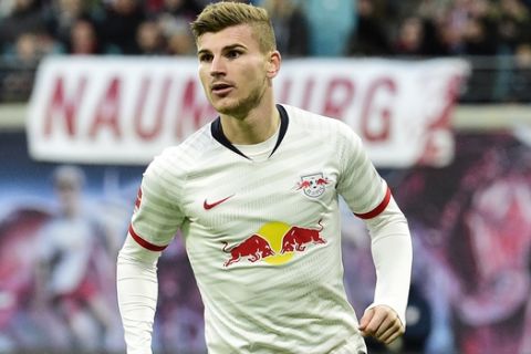 Leipzig's Timo Werner in action during the German Bundesliga soccer match between RB Leipzig and FC Augsburg in Leipzig, Germany, Saturday, Dec. 21, 2019. (AP Photo/Jens Meyer)