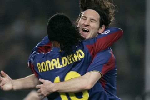 FC Barcelona's Leo Messi of Argentina, right,  celebrates with Ronaldinho of Brazil after Messi scored against Rangers FC during a Group E Champions League soccer match at the Camp Nou stadium in Barcelona, Spain, Wednesday Nov. 7, 2007. (AP Photo/Paul White)