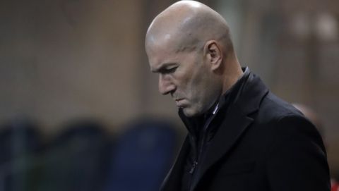Real Madrid's head coach Zinedine Zidane walks on the touchline ahead the Champions League, round of 16, first leg soccer match between Atlanta and Real Madrid, at the Gewiss Stadium in Bergamo, Wednesday, Feb. 24, 2021. (AP Photo/Luca Bruno)
