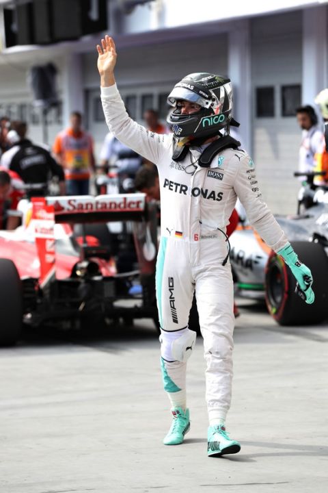 BUDAPEST, HUNGARY - JULY 23: Nico Rosberg of Germany and Mercedes GP waves to the crowd after qualifying in pole position during qualifying for the Formula One Grand Prix of Hungary at Hungaroring on July 23, 2016 in Budapest, Hungary.  (Photo by Mark Thompson/Getty Images)