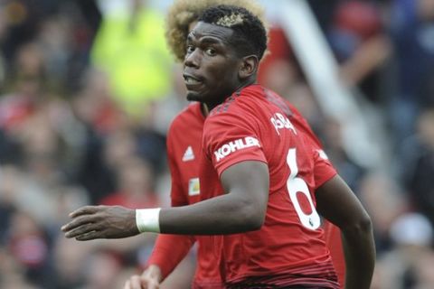Manchester United's Paul Pogba during the English Premier League soccer match between Manchester United and Wolverhampton Wanderers at Old Trafford stadium in Manchester, England, Saturday, Sept. 22, 2018. (AP Photo/Rui Vieira)